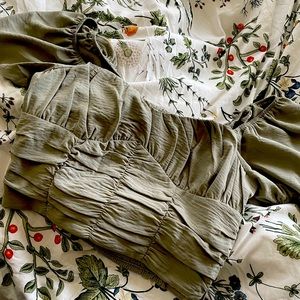 Sage green corset style top with puff sleeves